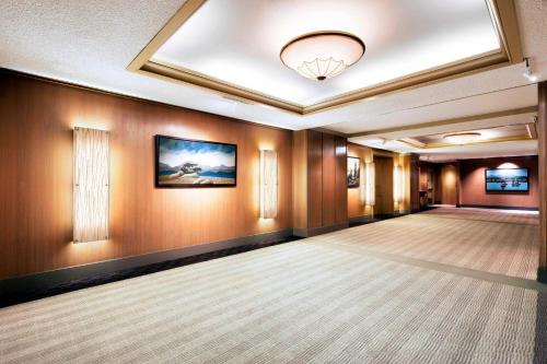 a ballroom with a large room with a ceiling at The Westin Calgary in Calgary