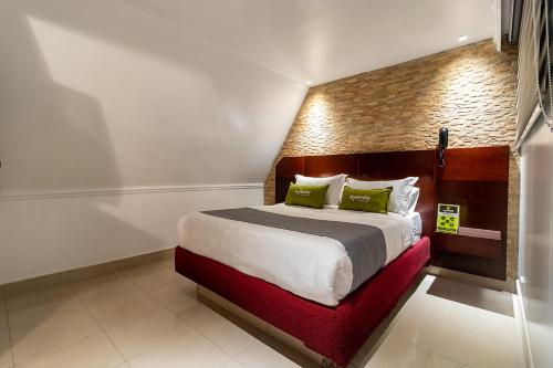 Postel nebo postele na pokoji v ubytování Lavid Hotel Palacio Real
