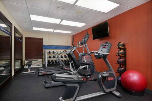 a gym with a treadmill and a exercise bike at Hampton Inn Beaumont in Beaumont