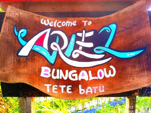 a sign that says welcome to buzabanducha tea bath at Ariel Bungalow Tetebatu in Tetebatu