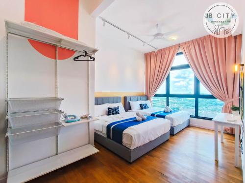 a bedroom with two beds and a large window at Skudai Paradigm Mall by RR JBcity in Johor Bahru