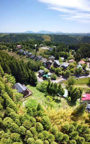 an aerial view of a village with trees at 黒川　天空の城 in Minamioguni
