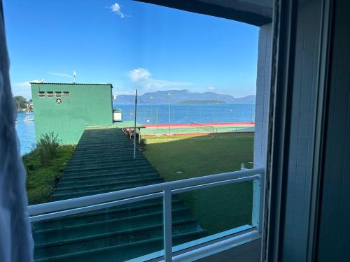 a view of a basketball court from a window at Angra inn, Angra dos Reis in Angra dos Reis