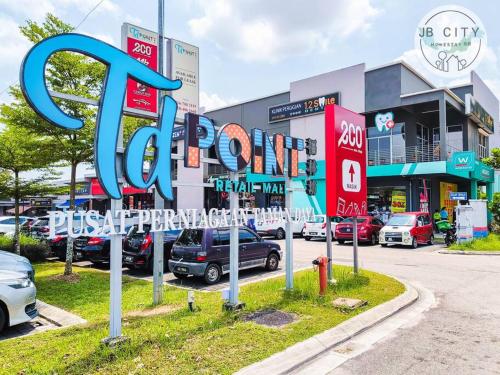 a sign in front of a parking lot with cars at Two-Nine Muslim Villa by RR JBcity in Johor Bahru