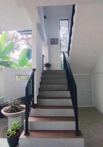 a staircase leading up to a house at Shine Ray VILLA in Galle