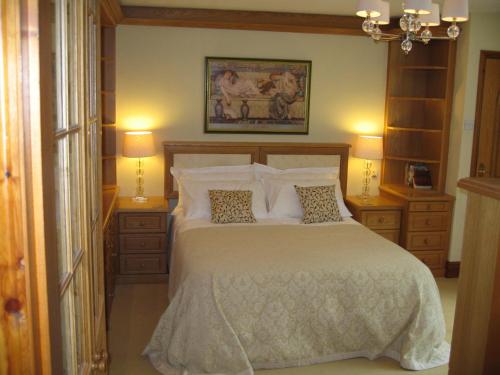 Voodi või voodid majutusasutuse Gardeners Cottage B and B toas