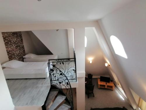Postel nebo postele na pokoji v ubytování Hotel Aristokrat