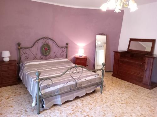 A bed or beds in a room at Casa vacanze Pitta