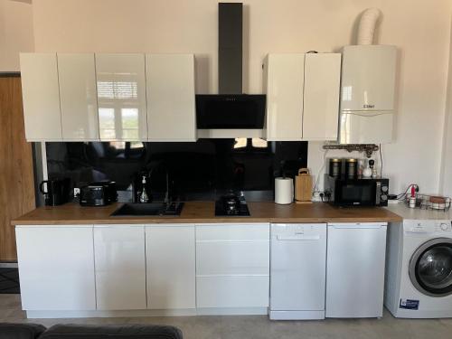 Dapur atau dapur kecil di Apartamenty Łuczkowskiego z widokiem na Studnię 2