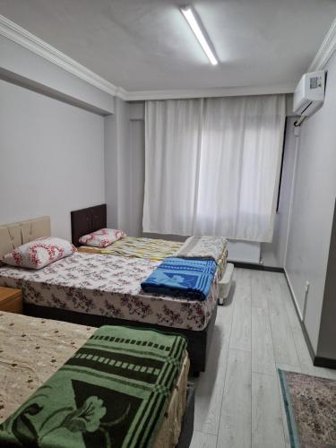 Postel nebo postele na pokoji v ubytování شقة سياحية