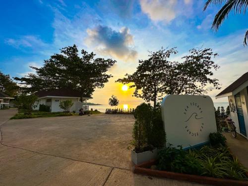 a view of the sunset from a parking lot at Sea Escape Koh Chang in Ko Chang