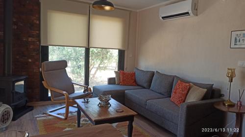Posezení v ubytování Semiramis Urla Guesthouse