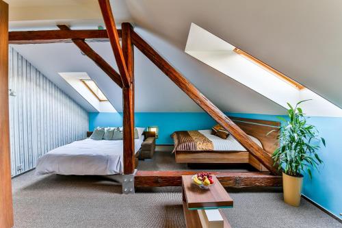A bed or beds in a room at Villa Aurelie