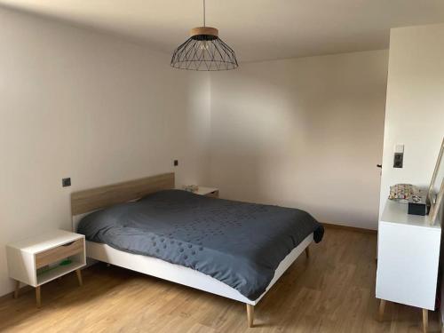 Giường trong phòng chung tại Maison cosy 130m2