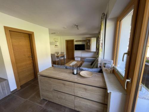 a kitchen with a sink and a counter top at Gästehaus Fohringer in Kelchsau