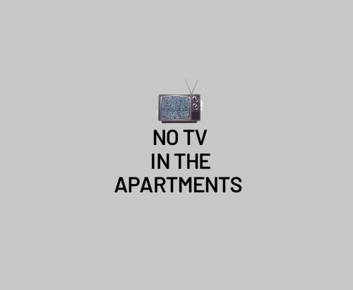 - un panneau indiquant qu'il n'y a pas de télévision dans les appartements dans l'établissement La Turr de Mezz- Bellagio LCA, à Bellagio