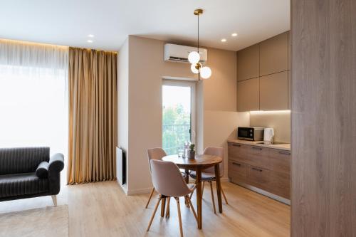 ММ GROUP APARTMENTにあるキッチンまたは簡易キッチン