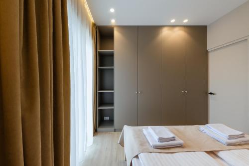 ММ GROUP APARTMENTにあるベッド