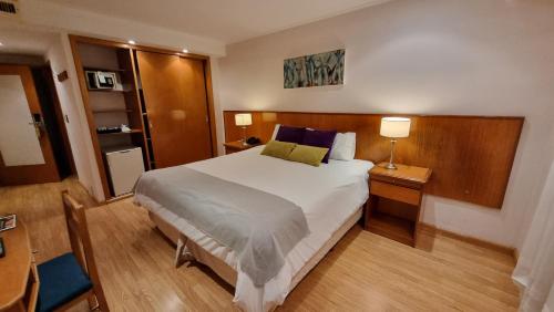Postel nebo postele na pokoji v ubytování Ñikén Hotel & Spa