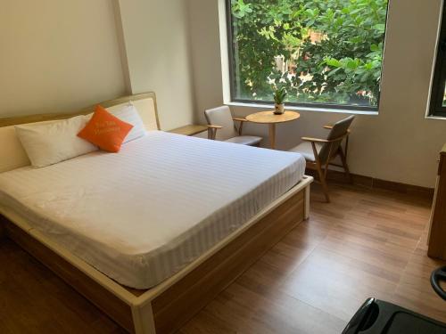 Postel nebo postele na pokoji v ubytování Bao Tran Homestay