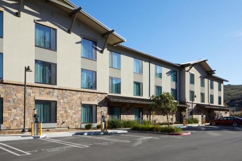 a building with a parking lot in front of it at TownePlace Suites by Marriott Thousand Oaks Agoura Hills in Agoura Hills