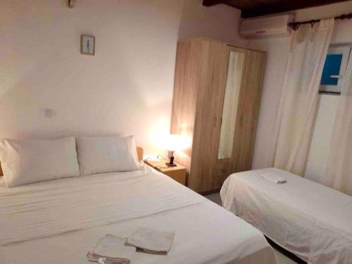 Postel nebo postele na pokoji v ubytování Apartment di Matteo