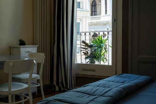 Voodi või voodid majutusasutuse iHOMES-Luxury Junior Suite vista Basilica Palladio toas