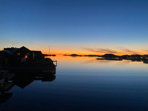 a view of a body of water at sunset at Skärhamns Paradis in Skärhamn