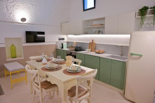 Kuchyň nebo kuchyňský kout v ubytování Jrooms - Apulian Home