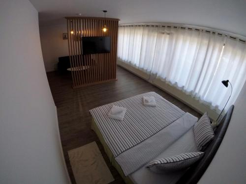 Ένα ή περισσότερα κρεβάτια σε δωμάτιο στο Cochet Accommodation