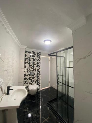 Ένα μπάνιο στο Aruna Boutique Hotel