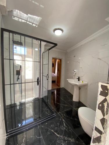 Ένα μπάνιο στο Aruna Boutique Hotel
