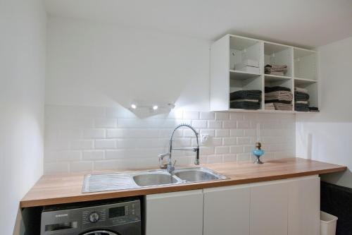 Køkken eller tekøkken på Le Solaret Famille