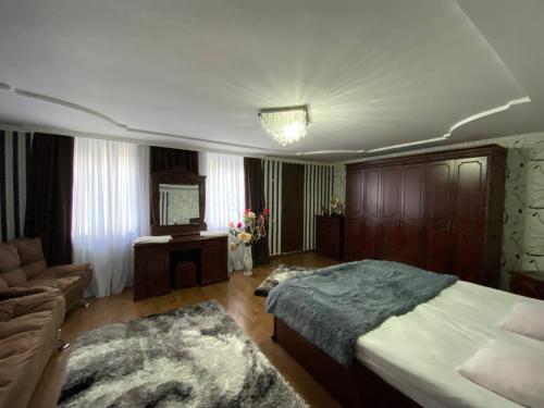 Postel nebo postele na pokoji v ubytování Guest House Misho