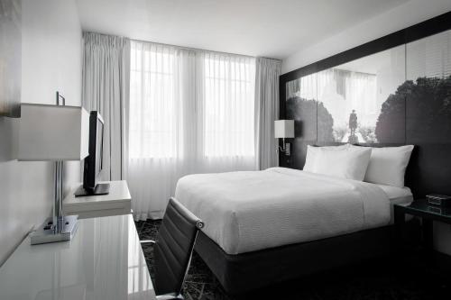 a hotel room with a bed and a television at Residence Inn by Marriott Philadelphia Center City in Philadelphia