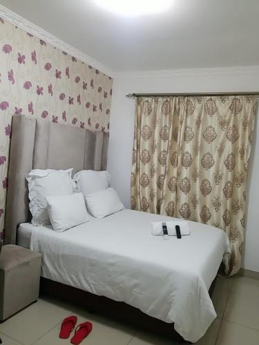 Ένα ή περισσότερα κρεβάτια σε δωμάτιο στο Pinto City Motel