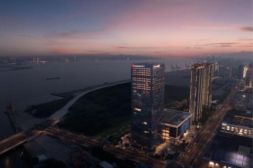 a view of a city at night with a tall building at Shantou Marriott Hotel in Shantou