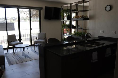 Η κουζίνα ή μικρή κουζίνα στο Residencias La Estación San Miguel de Allende