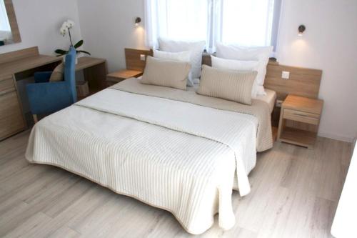 Posteľ alebo postele v izbe v ubytovaní Willa Grande