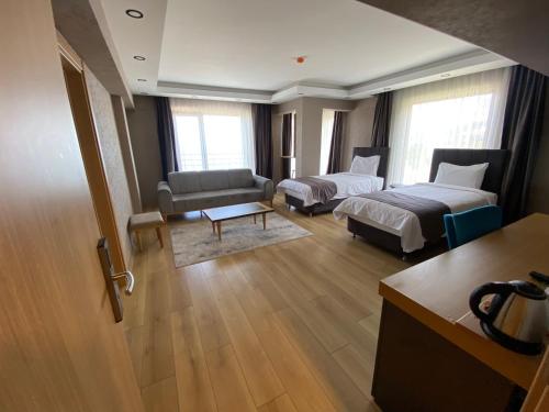 Katil atau katil-katil dalam bilik di Şehrar Suite Hotel
