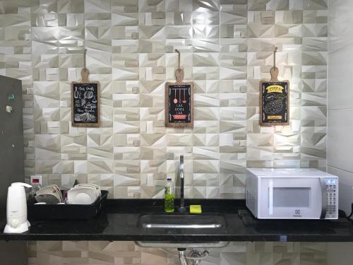 Dapur atau dapur kecil di Pousada Dourados de Itaúna