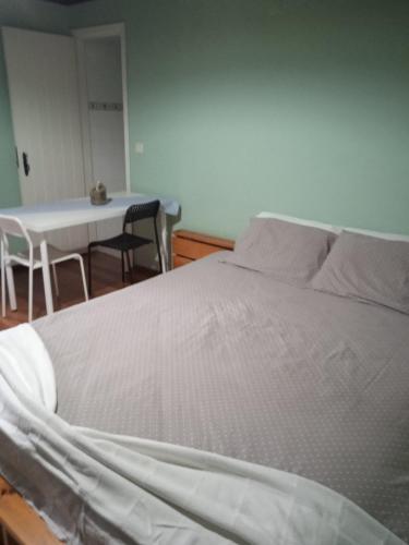 Katil atau katil-katil dalam bilik di Quinta dos Campos - Apartamento 1