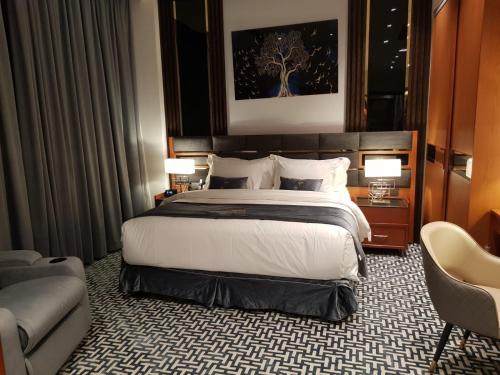 Ein Bett oder Betten in einem Zimmer der Unterkunft STwin Hotel