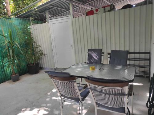 a table and chairs sitting on a patio at Apartments Mare in Pula
