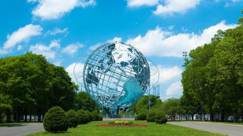 a large globe in the middle of a park at Hotel Indigo Flushing - LaGuardia in Queens