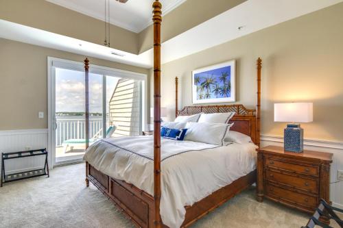 a bedroom with a bed and a large window at Ocean City Condo with Panoramic Views Walk to Beach in Ocean City