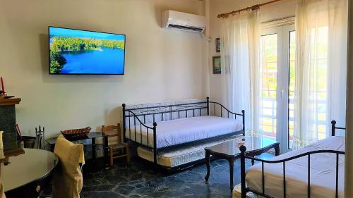 Ένα ή περισσότερα κρεβάτια σε δωμάτιο στο Eva Seaside 1st Floor
