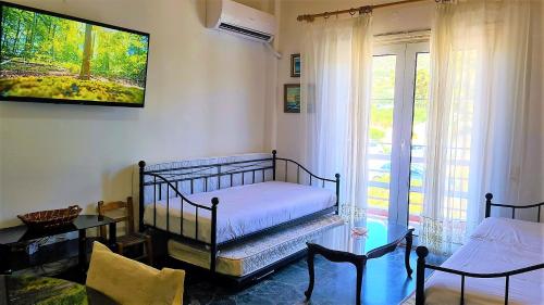 Ένα ή περισσότερα κρεβάτια σε δωμάτιο στο Eva Seaside 1st Floor