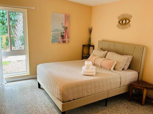 Katil atau katil-katil dalam bilik di GardenHouse @AudubonPark Sleeps 8