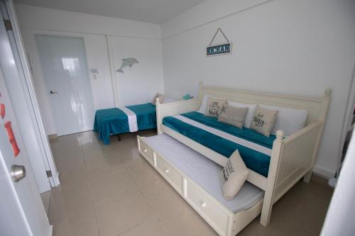 Postel nebo postele na pokoji v ubytování El Velero 203 en Boquerón
